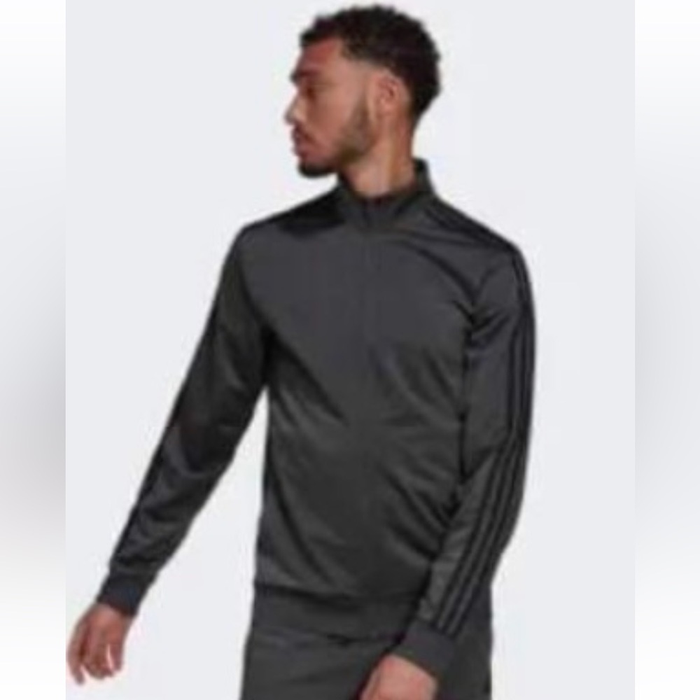 Addidas track suit.